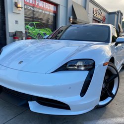 Photo of Sticker City - Sherman Oaks, CA, US. Porsche Taycan Turbo S getting XPEL clear bra film installed plus the XPEL fusion ceramic coating. Invisible to the eye @ Stickercity