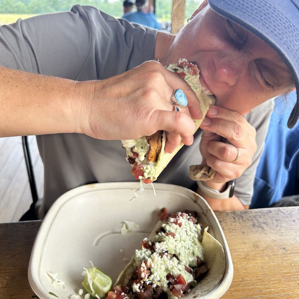 My wife with the first bite of Fresca tacos! My wife with the first bite of Fresca tacos!