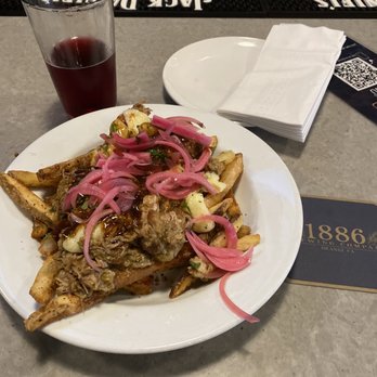 1886 Brewing - Brewery C Huckleberry seltzer and Chile Verde Fries - Brewpubs Near Me - Orange, California 1886 Brewing - Brewery C Huckleberry seltzer and Chile Verde Fries - Brewpubs Near Me - Orange, California