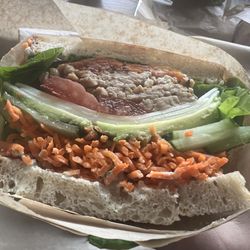 Roots Natural Foods - Veggie sandwich with added tempeh, roasted tomatoes, and provolone