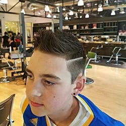 Living Proof Barbershop - Classic faux hawk with clean part on one of our favorite regulars!