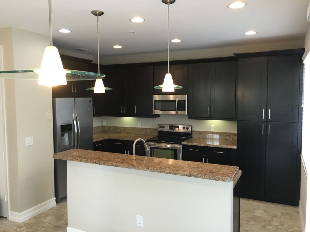 & DESIGNS Updated June 2024 26 Photos 4301 Oak Cir, Boca