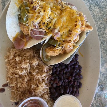Sunset Grille & Raw Bar - Lobster tacos. Yum! Has pickled onions and jalapeños on top. - Seafood Near Me - Marathon, Florida