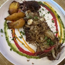 Vaca frita with plantanos maduros and extra onions Vaca frita with plantanos maduros and extra onions
