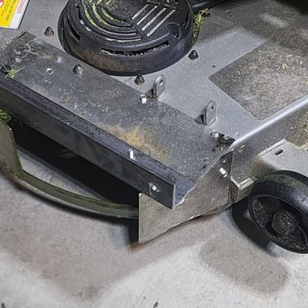 Dan's Lawnmower Center - 2nd attempt with thick angle iron added to hold the weight of the full catcher. - Outdoor Power Equipment Services Near Me - Rialto, California Dan's Lawnmower Center - 2nd attempt with thick angle iron added to hold the weight of the full catcher. - Outdoor Power Equipment Services Near Me - Rialto, California
