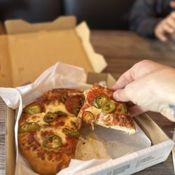 Fiesta Pizza - Pepperoni and jalapeno pizza.