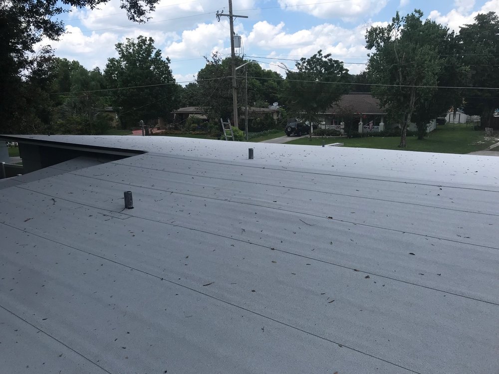 Slide of Veritas Roofers