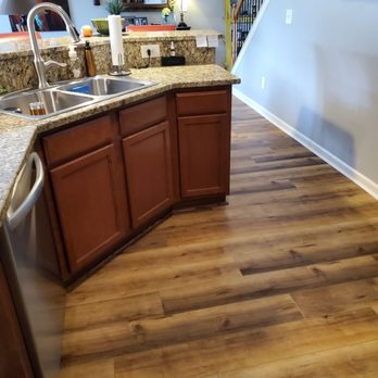 Hampton Restoration Group - a kitchen with wood flooring - Damage Restoration Near Me - Jasper, Georgia