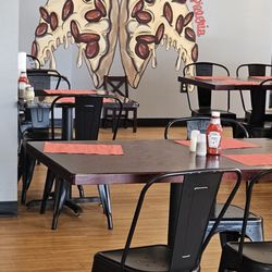 Lelulos Pizzeria - Photo op. wall art. (They are wings!)