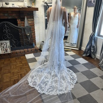 Sweet Lana's Alterations - My dress after alterations. She hand sewed the lace detail on the bottom back onto my dress after she shortened it - Sewing & Alterations Near Me - Mesa, Arizona