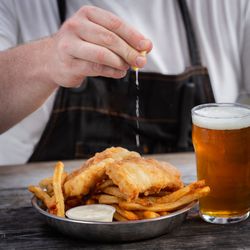 Little House - Fish & chips, made with wild pacific cod, battered in Topo Chico tempura, served with Danish remoulade and our hand cut fries