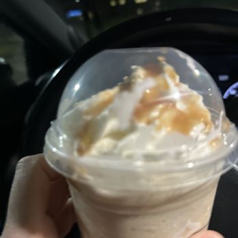 Starbucks - a hand holding a cup of ice cream - Coffee & Tea Near Me - Gurnee, Illinois