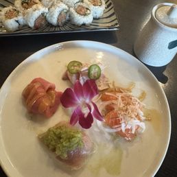 Sashimi sampler and spicy yellow tail roll Sashimi sampler and spicy yellow tail roll