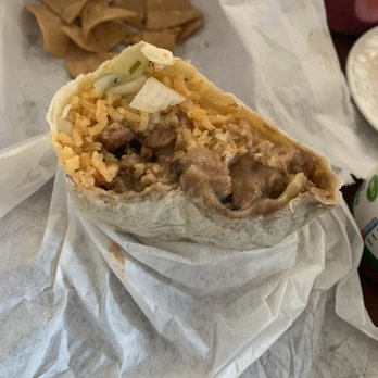 El Corral Baja Grill  - Combination of rice n beans n a lil piece of chicken n over cooked chips. - Mexican Near Me - Riverside, California