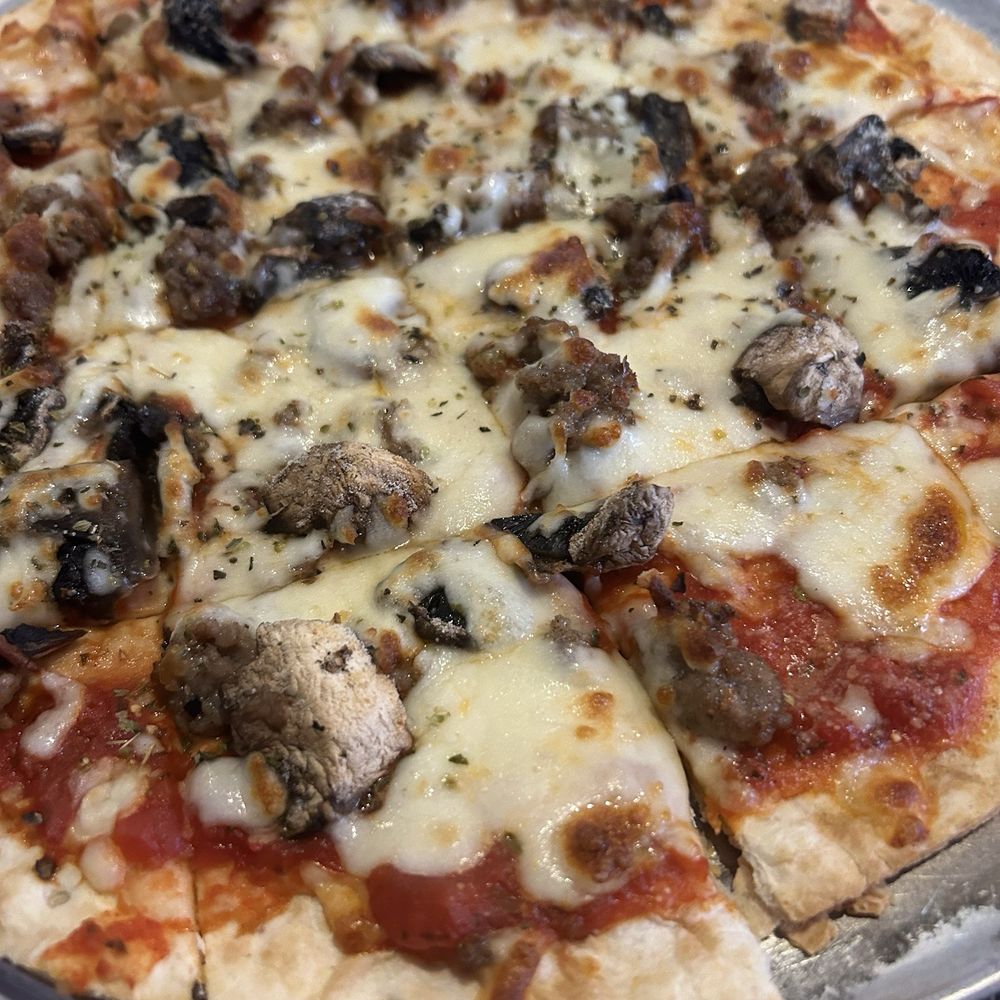 Tiny's - Sausage and mushroom pizza - Restaurants Near Me - Columbia, Illinois Tiny's - Sausage and mushroom pizza - Restaurants Near Me - Columbia, Illinois