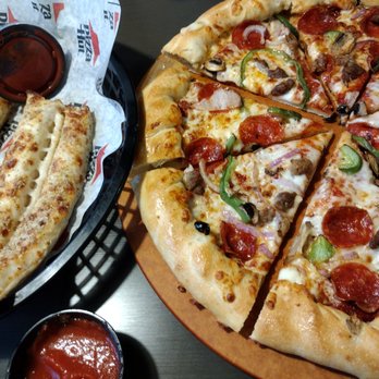 Pizza Hut - a pizza with pepperoni, mushrooms, and other toppings - Pizza Near Me - Hinton, West Virginia Pizza Hut - a pizza with pepperoni, mushrooms, and other toppings - Pizza Near Me - Hinton, West Virginia