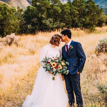 Love Is Blooming - Bride & groom with gorgeous flowers - Florists Near Me - Champlin, Minnesota Love Is Blooming - Bride & groom with gorgeous flowers - Florists Near Me - Champlin, Minnesota