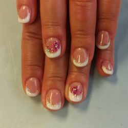 Milwaukee Area Technical College - $16 for gel nails with decorated gel nail polish, hand massage, & parafin dip.