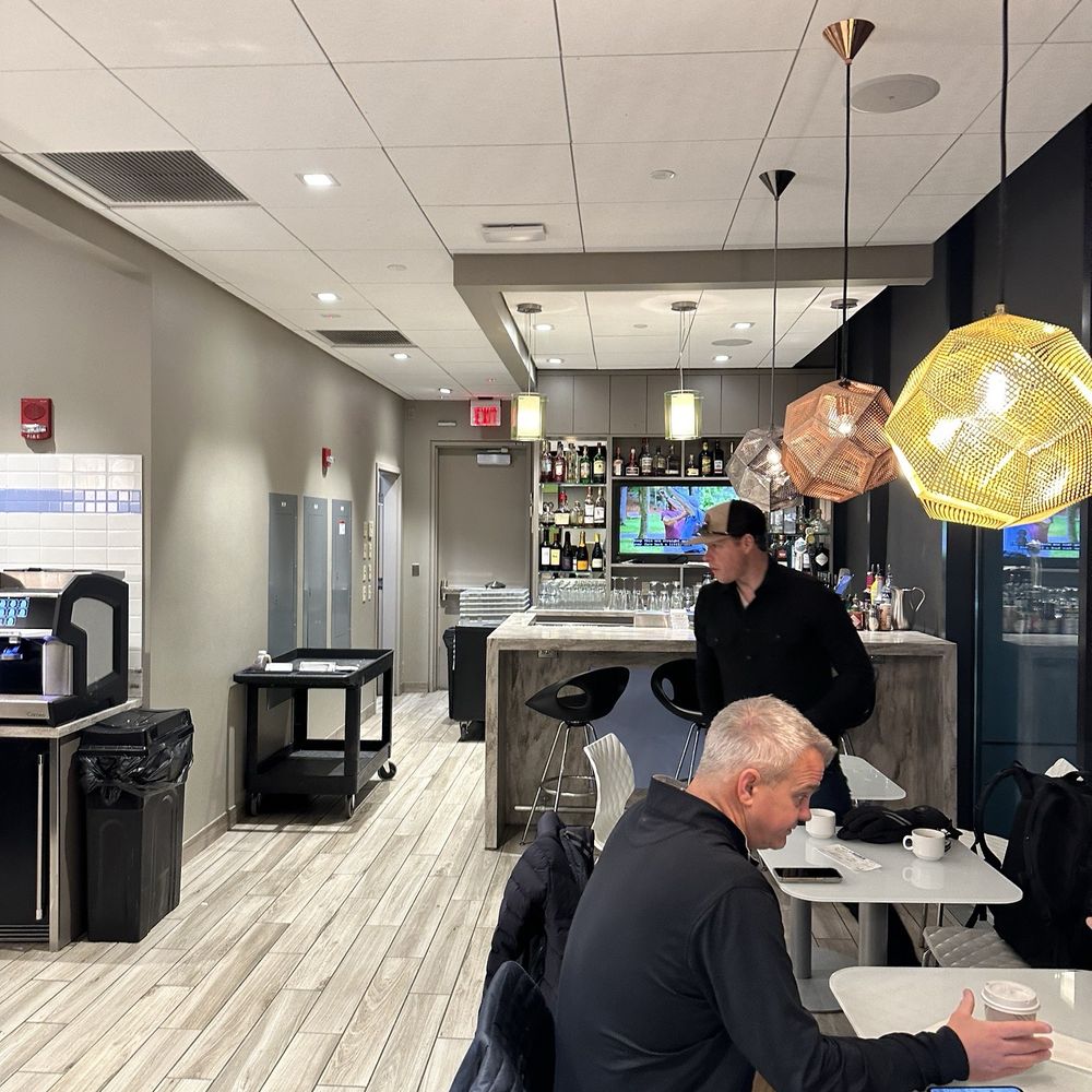 two men sitting at the counter
