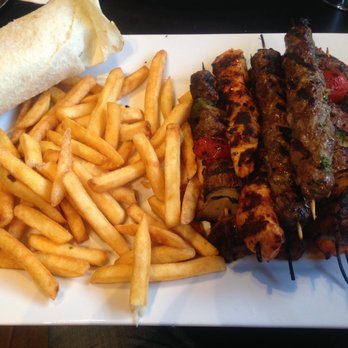 Yalla Grill - The Grilled Trio. This food cast a spell on me. I kept eating until I felt dizzy and I still had two-and-a-half skewers left over. - Lebanese Near Me - Methuen, Massachusetts Yalla Grill - The Grilled Trio. This food cast a spell on me. I kept eating until I felt dizzy and I still had two-and-a-half skewers left over. - Lebanese Near Me - Methuen, Massachusetts