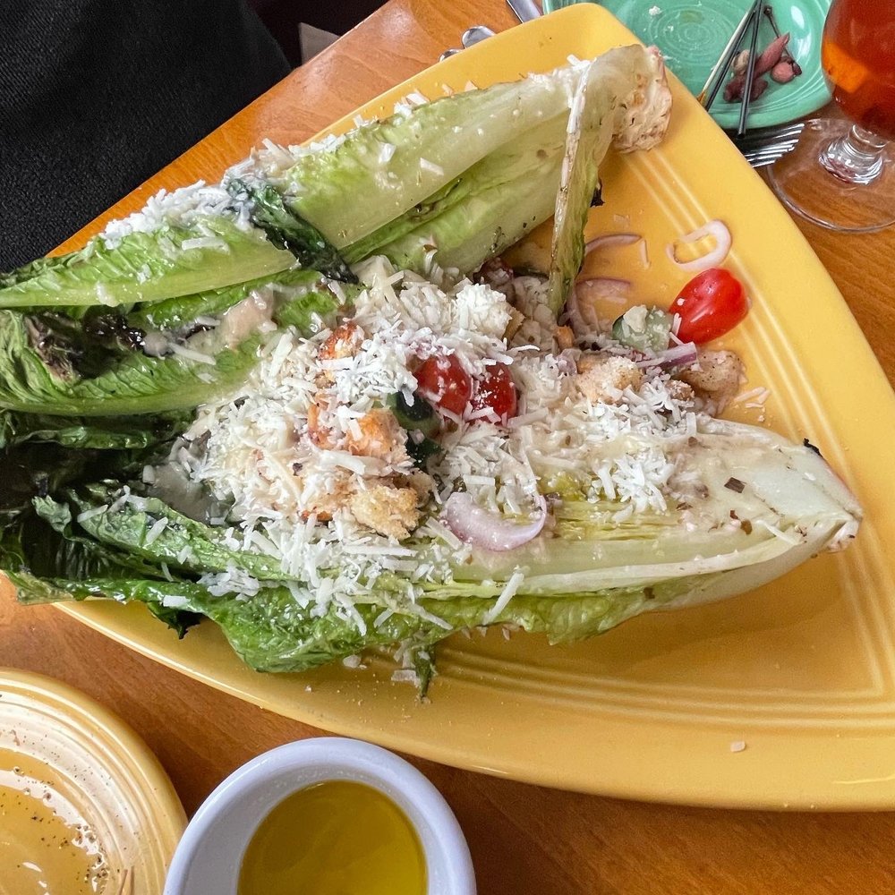Cafe Azafran - Grilled Romaine Caesar Salad shaved pecorino, tapenade croutons, grape tomato, lemon vinaigrette - Breakfast & Brunch Near Me - Rehoboth Beach, Delaware Cafe Azafran - Grilled Romaine Caesar Salad shaved pecorino, tapenade croutons, grape tomato, lemon vinaigrette - Breakfast & Brunch Near Me - Rehoboth Beach, Delaware