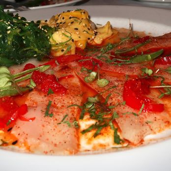 Ocean Prime - The Hamachi Crudo was served with Pickled Mango, Sweet Peppers, Cilantro, Sesame Ginger Vinaigrette. Gorgeous sushi dish and so fresh. - Seafood Near Me - Denver, Colorado