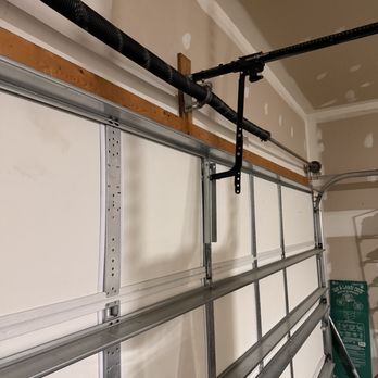 HT Garage Door Services - Repaired garage door and bracket support. - Garage Door Services Near Me HT Garage Door Services - Repaired garage door and bracket support. - Garage Door Services Near Me