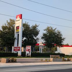 Petro-Canada - Change in front of the gas station. There's a bike lane and I'm presuming a bus stop with seating.