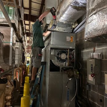 McCombs Electrical Heating & Air - McCombs expert HVAC tech, Cody, working on a commercial air handler for a Pensacola, FL customer. - Electricians Near Me - Milton, Florida McCombs Electrical Heating & Air - McCombs expert HVAC tech, Cody, working on a commercial air handler for a Pensacola, FL customer. - Electricians Near Me - Milton, Florida