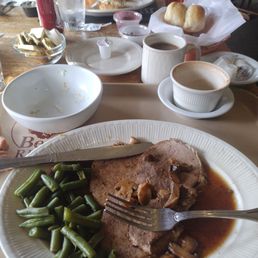 Roast beef, green beans, vegetable soup, and a salad.