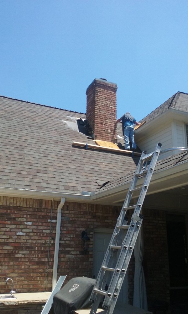 Slide of Humberto's Roofing Service