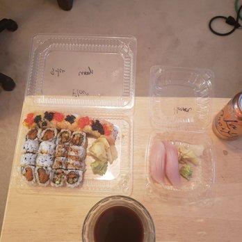 Miku Sushi Restaurant - Flaming Dragon, Spicy Tuna, Umagi, and Yellow Tail Nigiri. - Sushi Bars Near Me - Chicago, Illinois Miku Sushi Restaurant - Flaming Dragon, Spicy Tuna, Umagi, and Yellow Tail Nigiri. - Sushi Bars Near Me - Chicago, Illinois