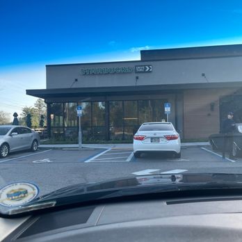 Starbucks - a car parked in front of a starbucks coffee shop - Coffee & Tea Near Me - Jacksonville, Florida Starbucks - a car parked in front of a starbucks coffee shop - Coffee & Tea Near Me - Jacksonville, Florida