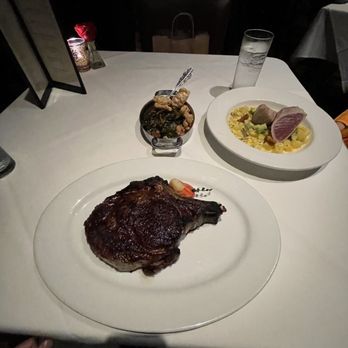 Porch and Parlor - Bone in Rib-eye, Ahi Tuna, Collard Greens - Steakhouses Near Me - Memphis, Tennessee