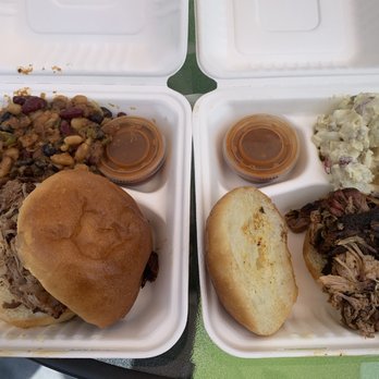 Shotgun Willie's BBQ - Pulled Pork sandwich with beans and potato salad. - Barbeque Near Me - Madison, Tennessee Shotgun Willie's BBQ - Pulled Pork sandwich with beans and potato salad. - Barbeque Near Me - Madison, Tennessee