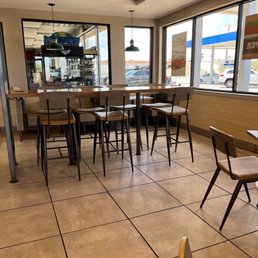 empty tables and chairs in a restaurant empty tables and chairs in a restaurant