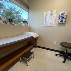 North Texas Orthopaedic & Spine - Exam room with natural light and spine diagram