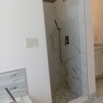 True Dream Renovations - Beautiful shower we did with a 10' ceiling. Rain head with wand attachment. - Flooring Near Me - Deltona, Florida True Dream Renovations - Beautiful shower we did with a 10' ceiling. Rain head with wand attachment. - Flooring Near Me - Deltona, Florida