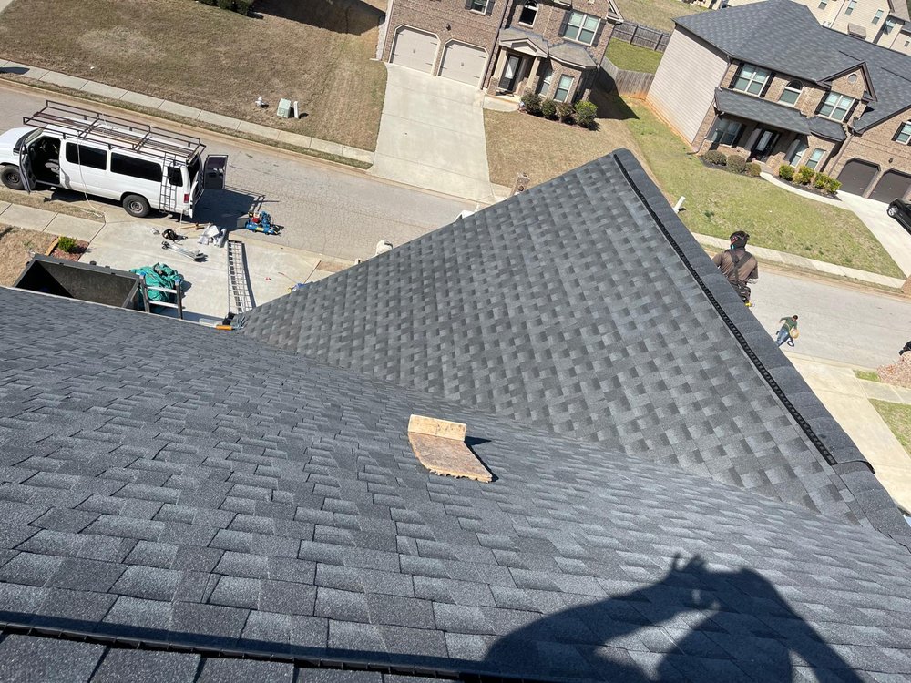 Slide of Umana Roofing