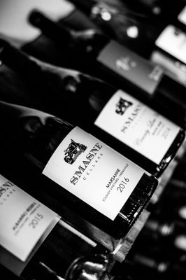 Photo of Smasne Cellars Tasting Room - Woodinville, WA, US. bottles of wine