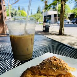Holly Rose Coffee Bar - Iced oat milk latte and chickpea empanada