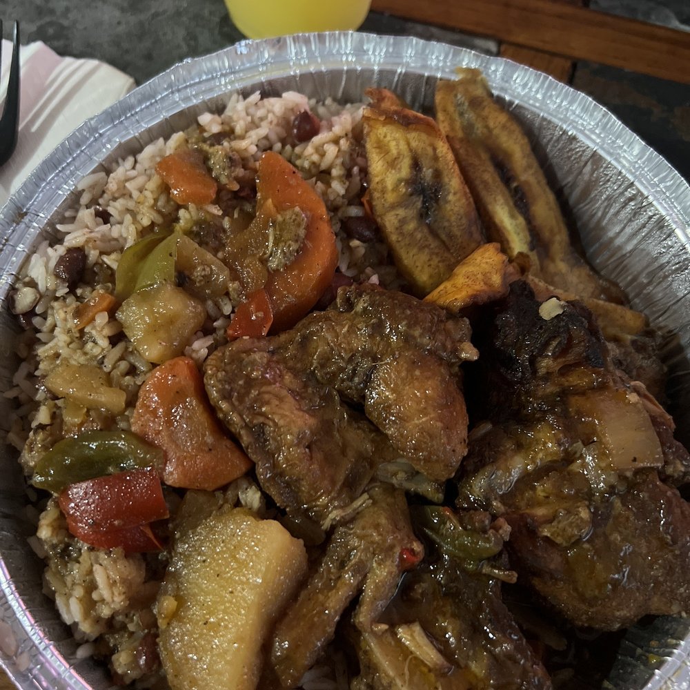 Large Stewed Chicken, Rice, and Plantains platter. Large Stewed Chicken, Rice, and Plantains platter.