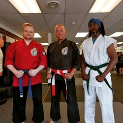 Mizuchi DoJo - The school owner (center) along with two of his students at a local competition. All three placed in their respective "Forms" bracket.