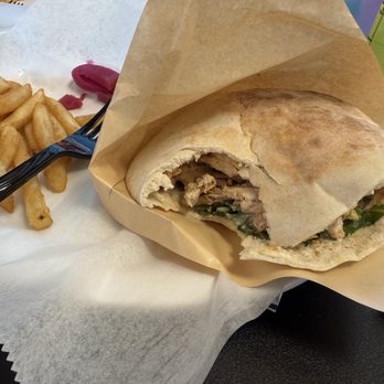 Kabab Falafel Addiction - Chicken Shawarma on pita ( I took a bite) - Mediterranean Near Me - Rehoboth Beach, Delaware Kabab Falafel Addiction - Chicken Shawarma on pita ( I took a bite) - Mediterranean Near Me - Rehoboth Beach, Delaware