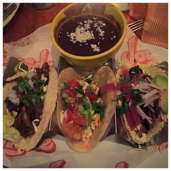 Joyride Taco House - Tacos from left to right: Carne Asada, Crispy Fish, and Braised Beef. - Tacos Near Me - Phoenix, Arizona Joyride Taco House - Tacos from left to right: Carne Asada, Crispy Fish, and Braised Beef. - Tacos Near Me - Phoenix, Arizona
