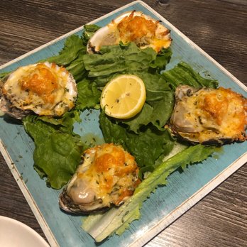Captain Brad's Coastal Kitchen - Crab topped (forgot the name) charbroiled oysters - Seafood Near Me - Tomball, Texas Captain Brad's Coastal Kitchen - Crab topped (forgot the name) charbroiled oysters - Seafood Near Me - Tomball, Texas