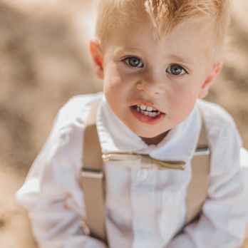 Walgreens - a young boy in a white shirt and suspenders - Drugstores Near Me - White Bear Lake, Minnesota