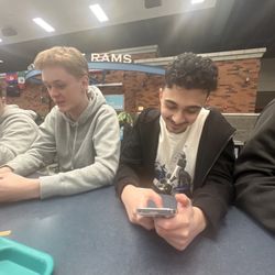 West Valley High School - Two nice young people annoying their friends company while at lunch.
