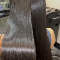 Keratin Complex treatment for stronger, shinier, and more manageable hair. Say goodbye to frizz and hello to effortless styling every day.
