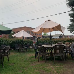 tables and umbrellas outside tables and umbrellas outside